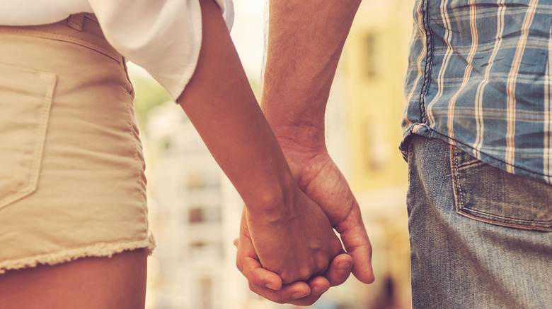 couple holding hands