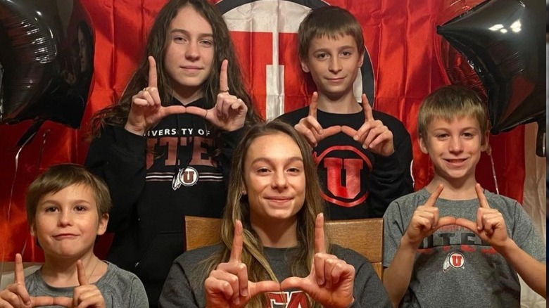 Grace McCallum posing with her family