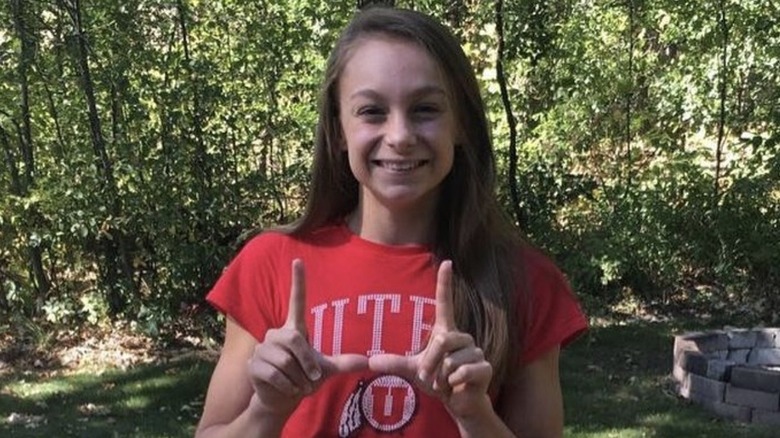 Grace McCallum posing in a Utah shirt