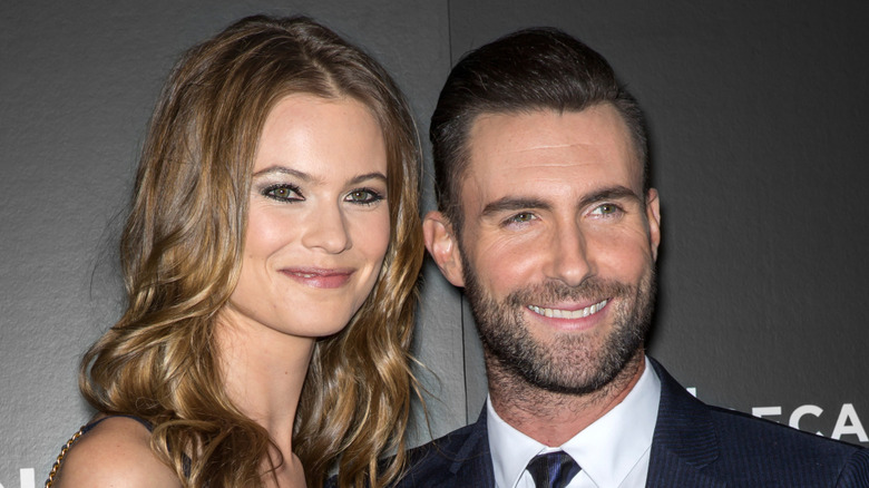 Model Behati Prinsloo and musician Adam Levine attend the closing night gala premiere of 'Begin Again' during the 2014 Tribeca Film Festival at BMCC Tribeca PAC