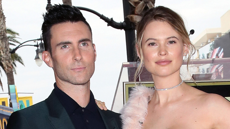 Recording artist Adam Levine (L) and wife model Behati Prinsloo attend his being honored with a Star on the Hollywood Walk of Fame on February 10, 2017 in Hollywood, California.