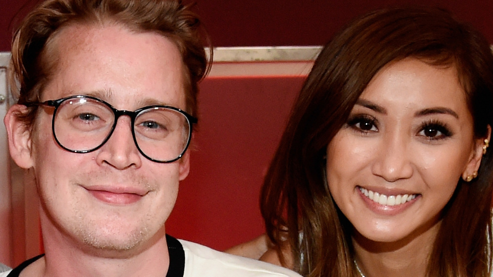 Macaulay Culkin Brenda Song smiling