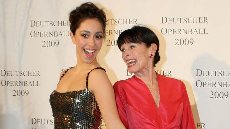 Oona Chaplin posing with her mother Geraldine Chaplin on step-and-repeat