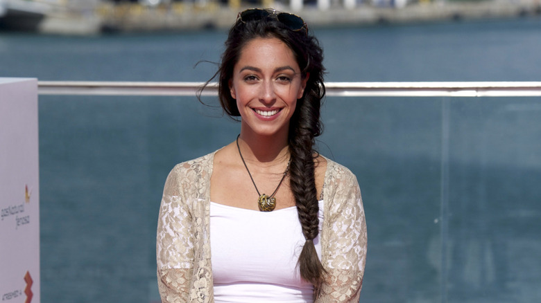 Oona Chaplin posing outdoors