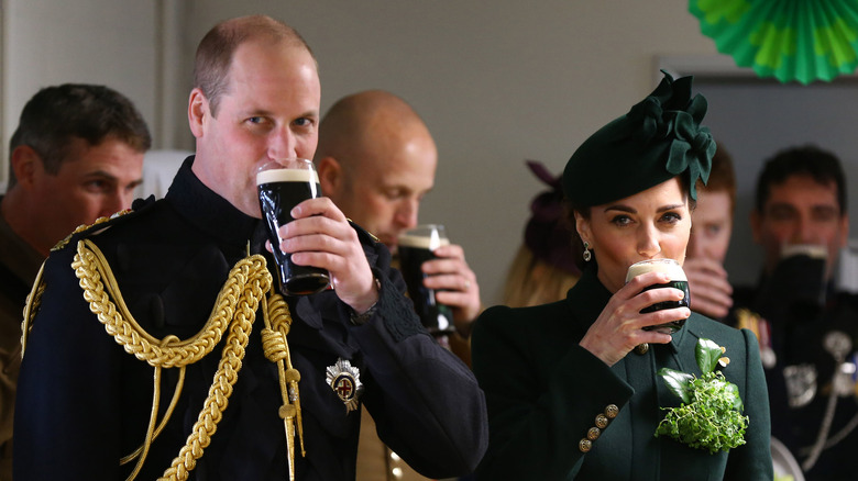 Prince William with Kate Middleton in a fascinator