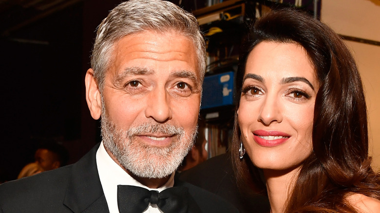 George and Amal Clooney smiling in a photo