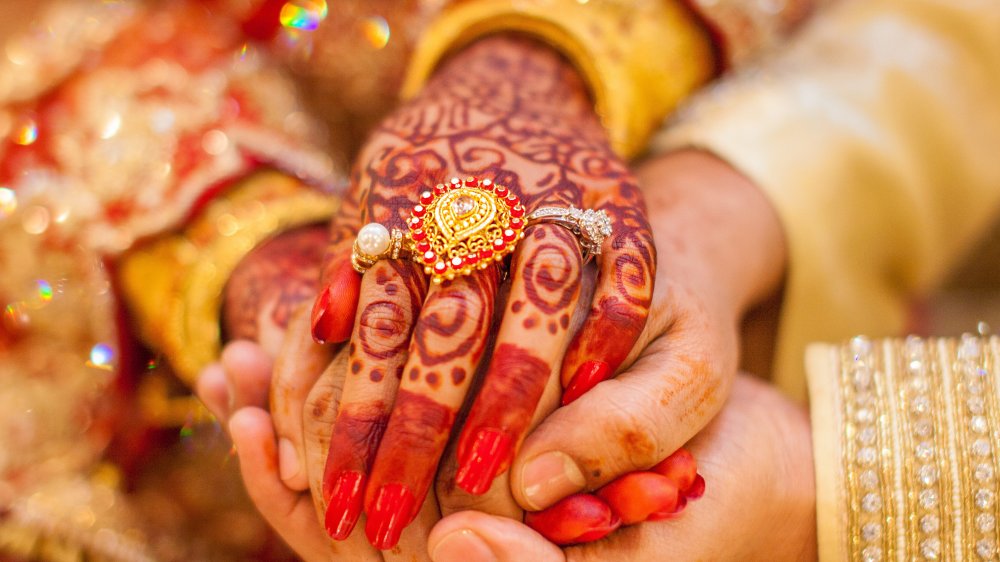 Henna tattoos at Indian wedding