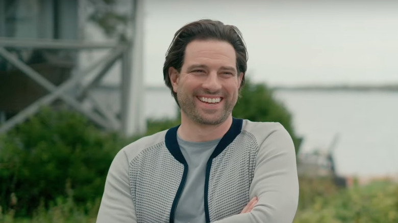 Scott McGillivray smiling in an episode of Vacation House Rules