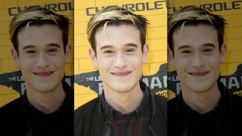 Tyler Henry with a small smile
