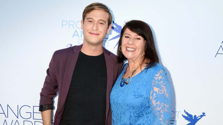 Tyler Henry and Theresa Koelewyn smiling