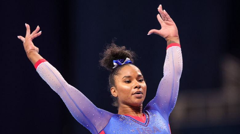 Jordan Chiles with raised hands