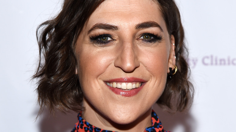 Mayim Bialik smiling at an event