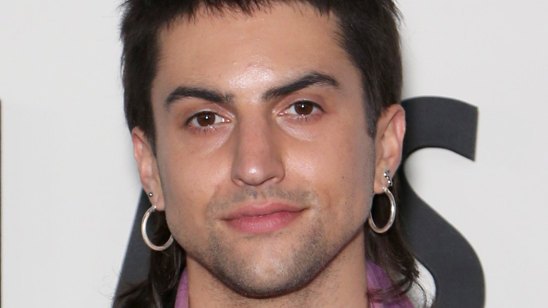 Mitch Grassi wearing hoops