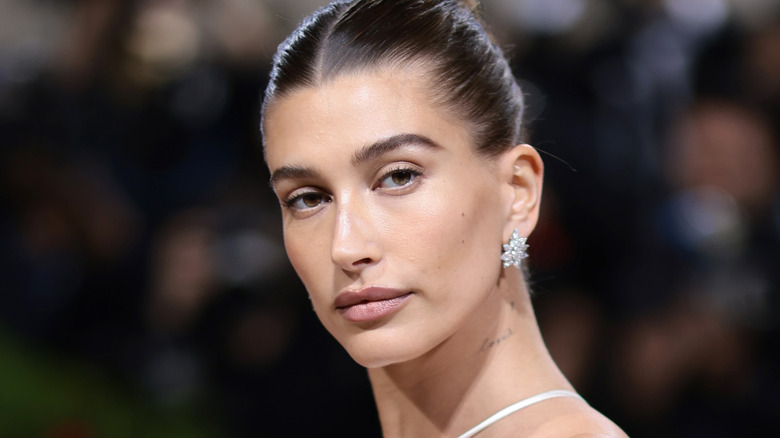 Hailey Bieber wearing white dress