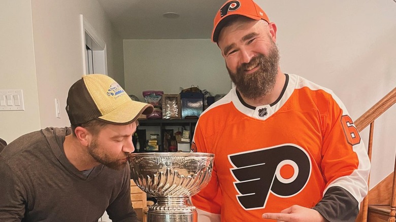 Joe O'Pella Jason Kelce posing with Stanley Cup