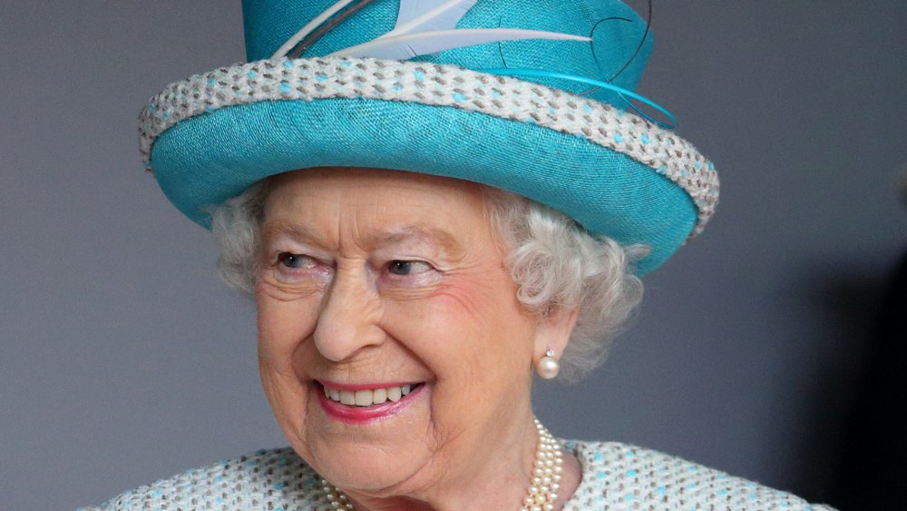 Queen Elizabeth in blue hat