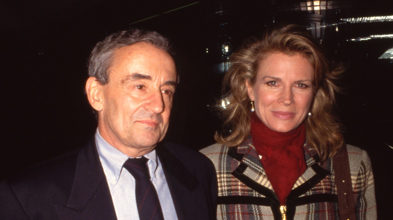 Louis Malle and Candice Bergen outside at night in the 1980s.