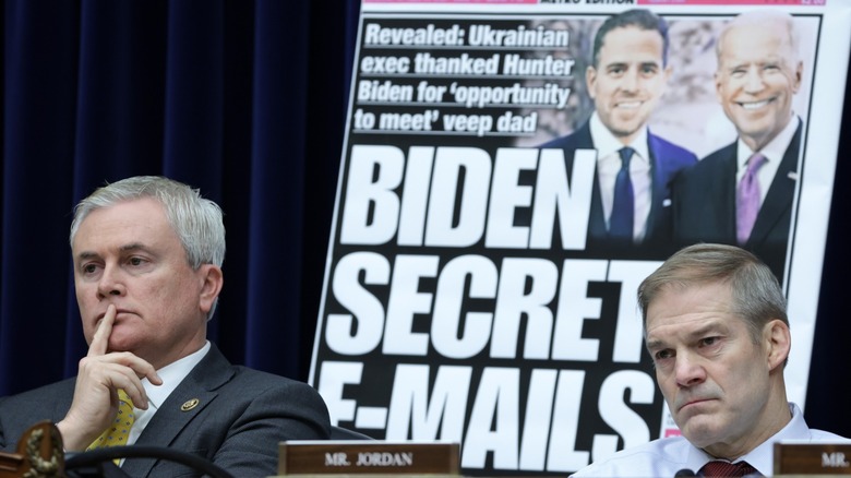 James Comer and Jim Jordan in front of large front page newspaper that reads, "Biden Secret E-Mails"