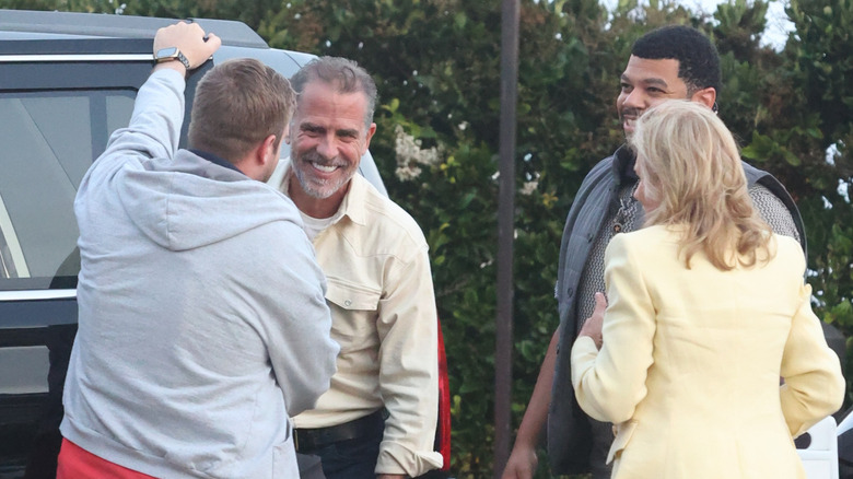 Hunter Biden laughing and greeting friends outside Nobu, Malibu