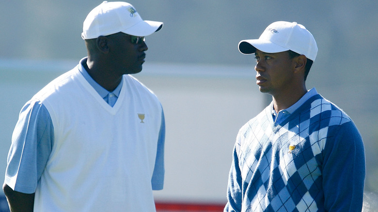 Michael Jordan Tiger Woods looking at each other