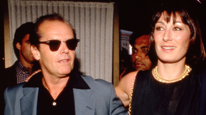 Jack Nicholson and Anjelica Huston posing together in the 1980s