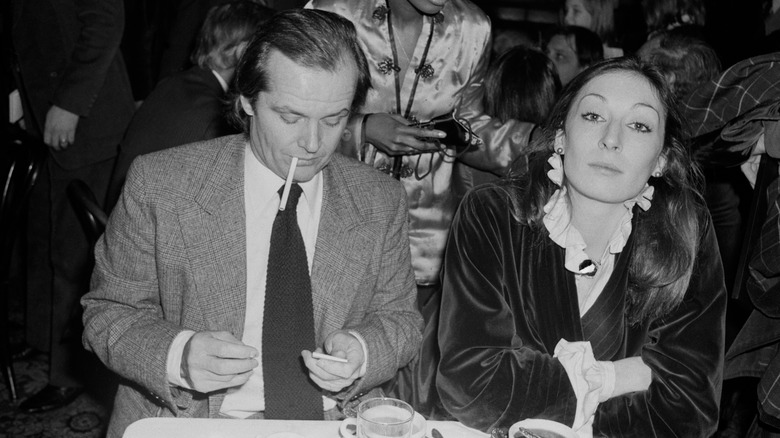Black and white photo of Jack Nicholson and Anjelica Huston at Sardi's