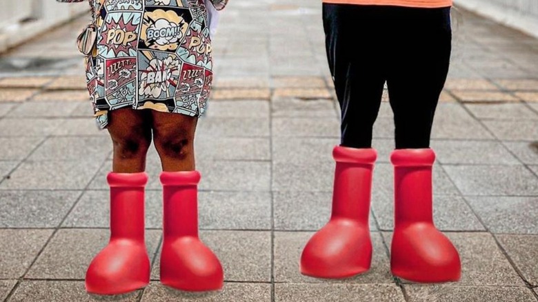 COuple wearing Mschf red boots
