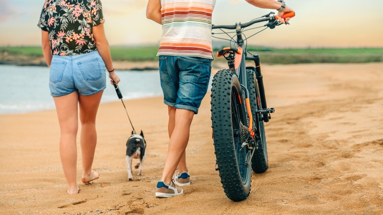 couple walking on the beach 