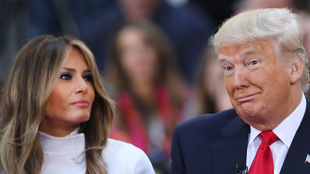 Melania Trump looks at her husband Donald
