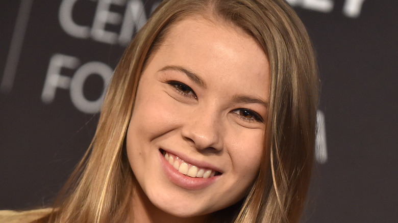 Bindi Irwin smiles on the red carpet