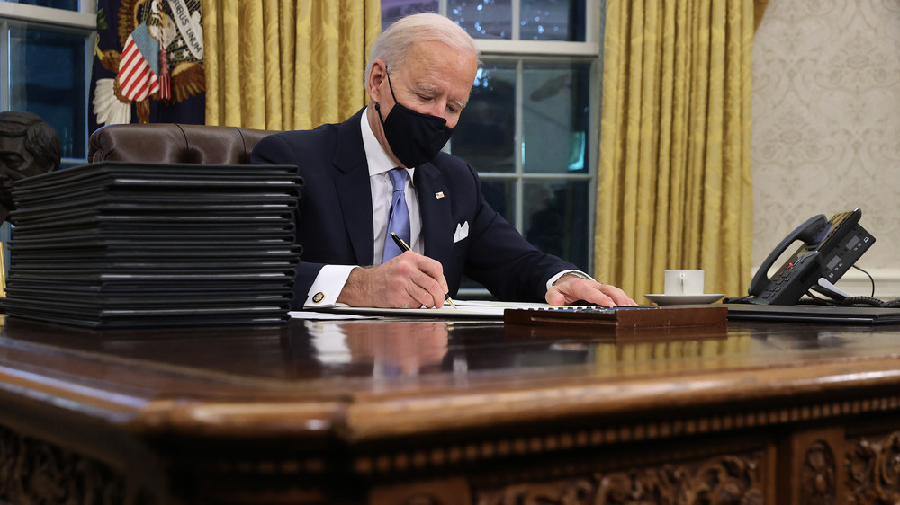 President Biden signing executive orders