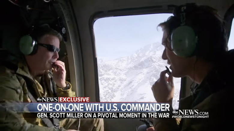 David Muir interviewing U.S. Commander General Scott Miller during a helicopter ride in Afghanistan