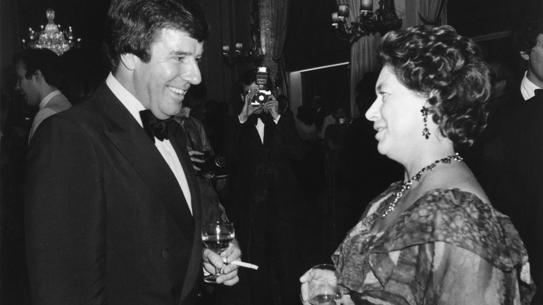 Princess Margaret chats up a television presenter at a party