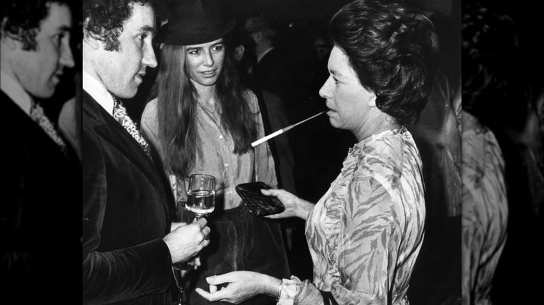 Princess Margaret smoking at a party