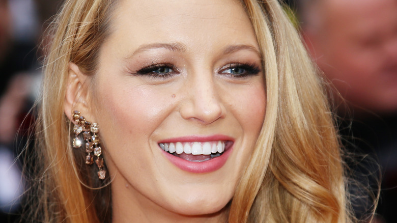 Blake Lively smiling on the red carpet