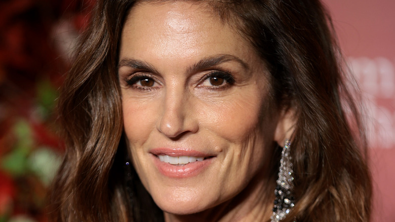 Cindy Crawford smiling at event
