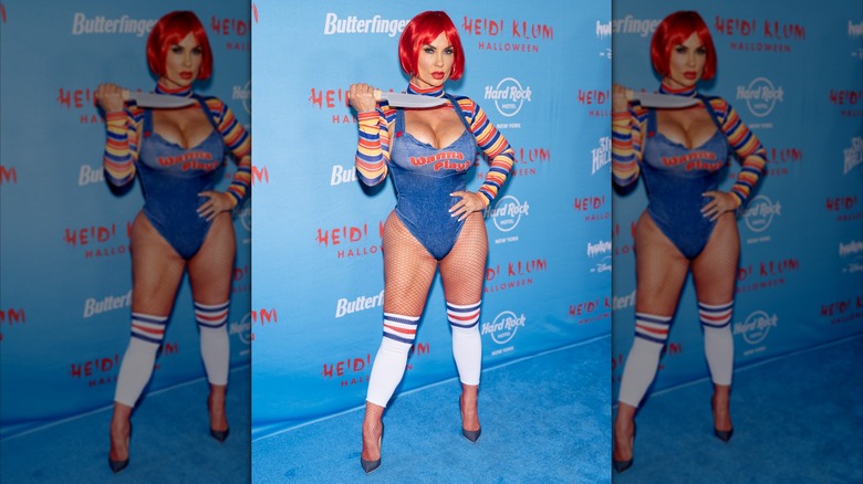 Coco Austin posing in costume