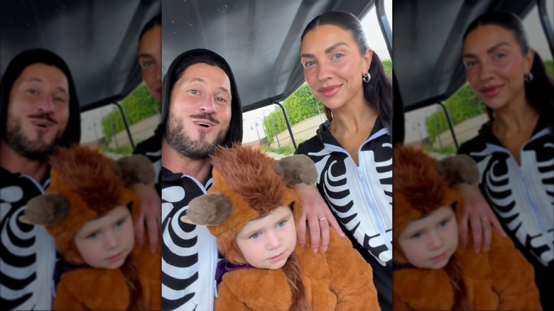 Val Chmerkovskiy and Jenna Johnson with their child