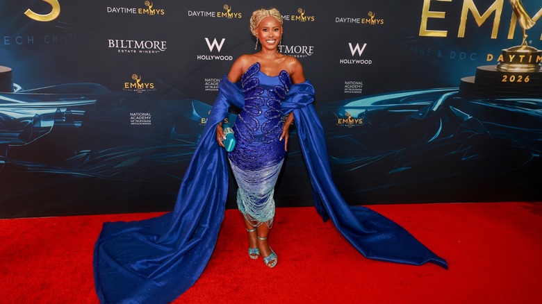 Jasmine Burke wearing blue on the red carpet