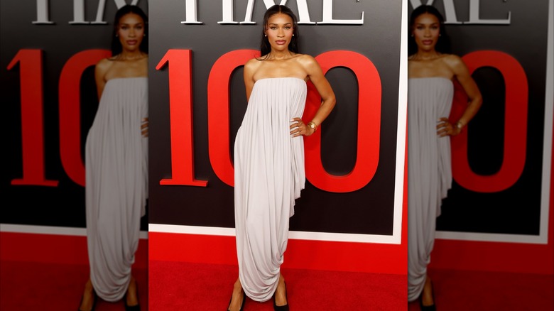 Ayan Broomfield in a white, sleeveless dress