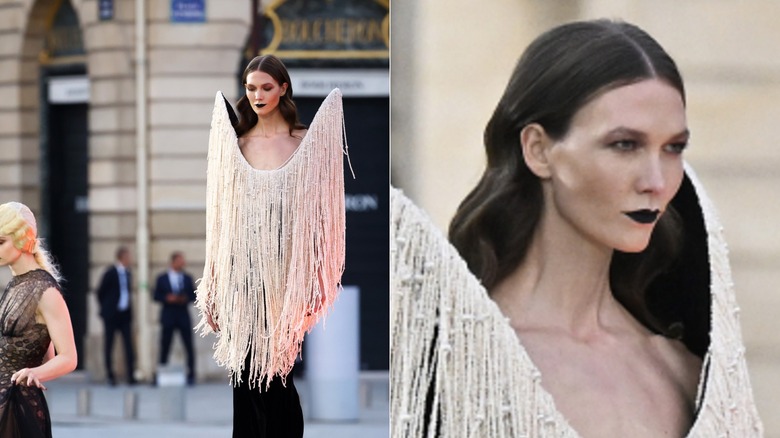 Karlie Kloss walking down the runway