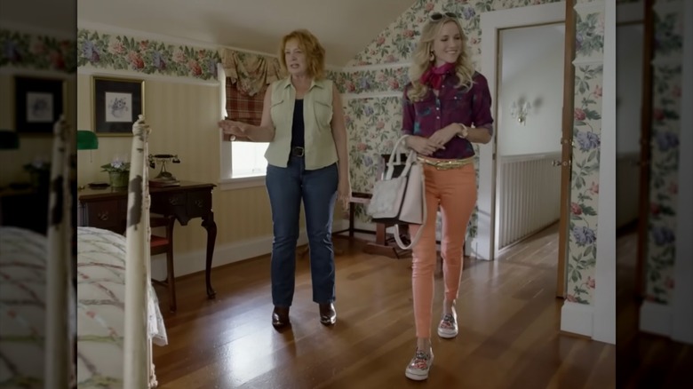 Screen grab of Jessy Schram walking in "Harvest Moon"