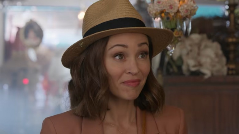 Autumn Reeser smiling in a hat