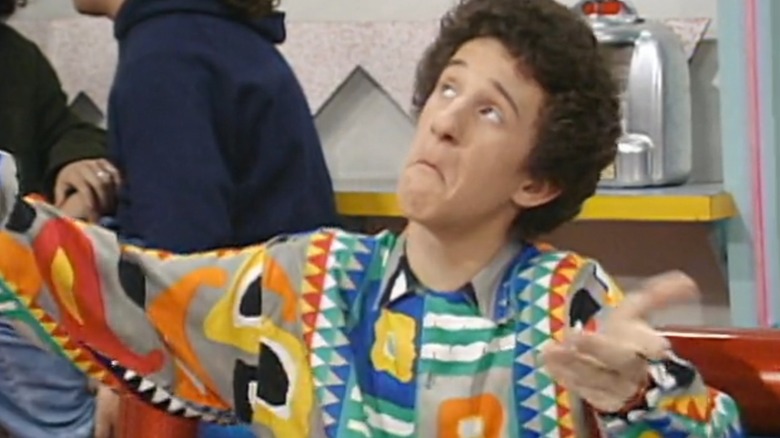 Dustin Diamond acting as Screech on Saved by the Bell.