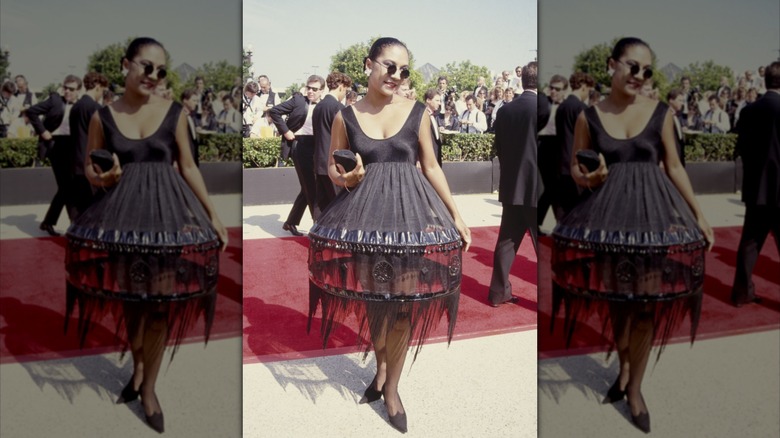 Olivia Brown in a brown dress with sunglasses