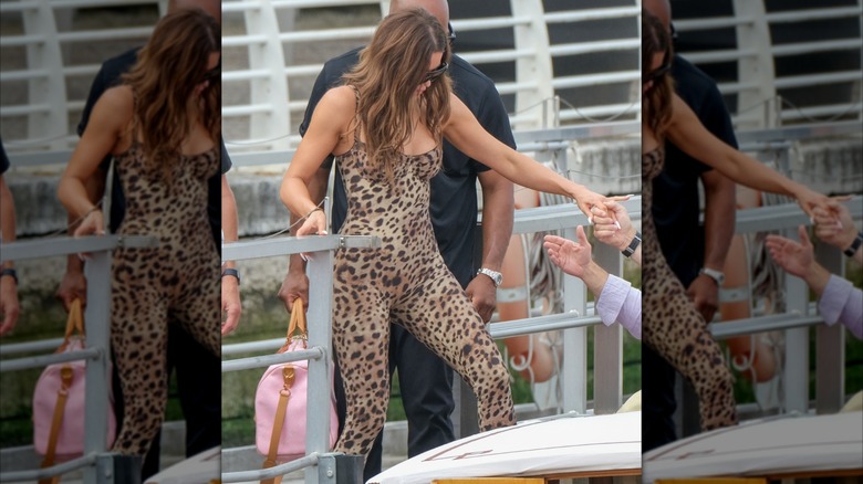 Khloe Kardashian  getting on a boat