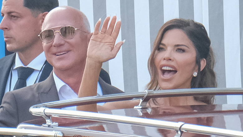 Jeff Bezos and Lauren Sanchez smiling