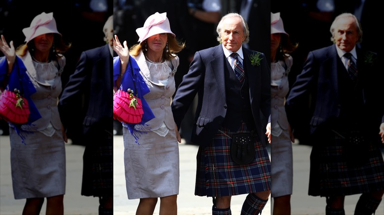 Sir Jackie Stewart and Helen Stewart walking