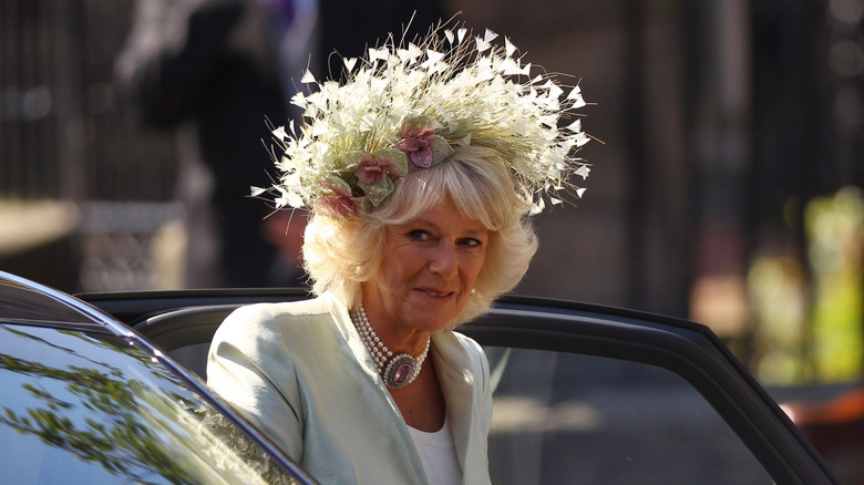 Queen Camilla getting out of a car