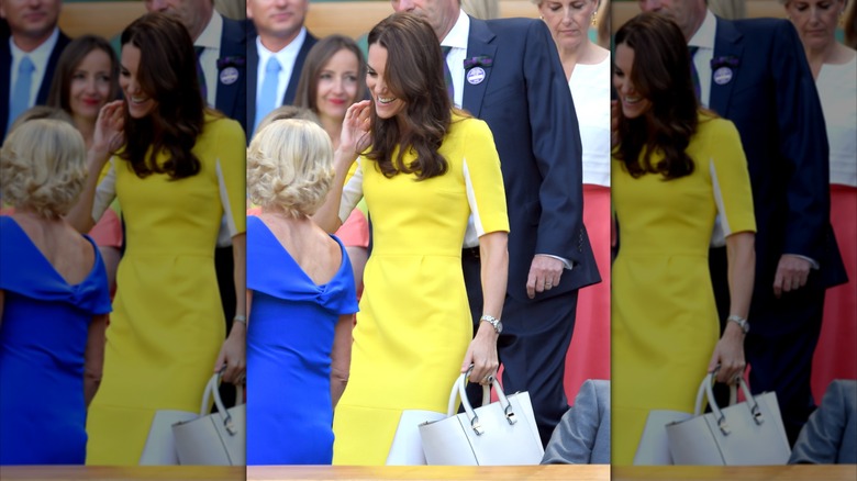 Princess Catherine walking in yellow dress at Wimbledon